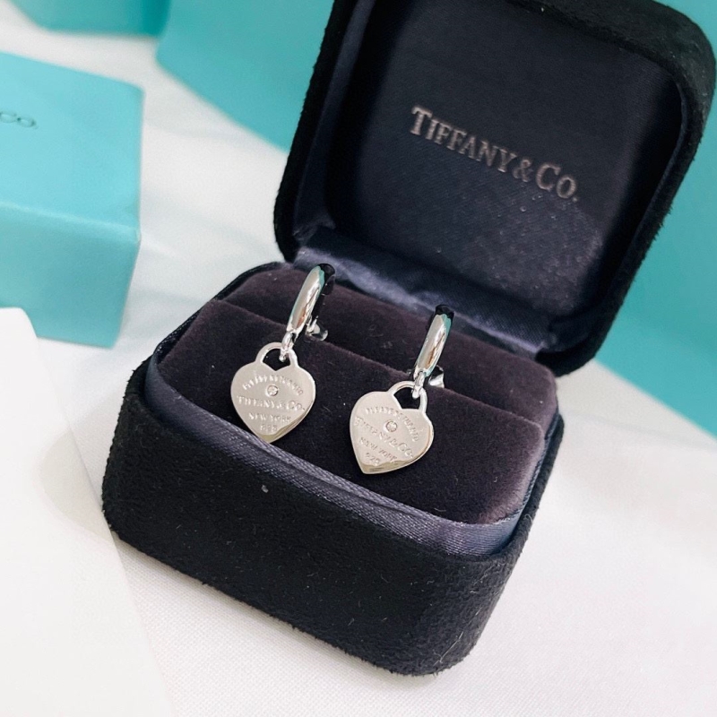T*f*ny earrings